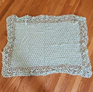 Hand-made knit green baby blanket